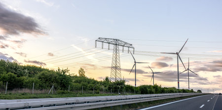 Wind turbines and power lines. Alternative electricity