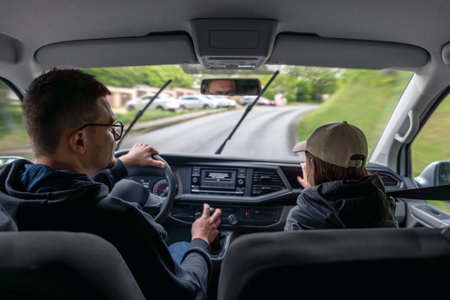 Driver in motion. Road ahead. Car journey.