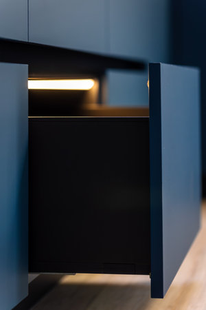 Light diagonal. Handleless drawer. Blue modernの写真素材