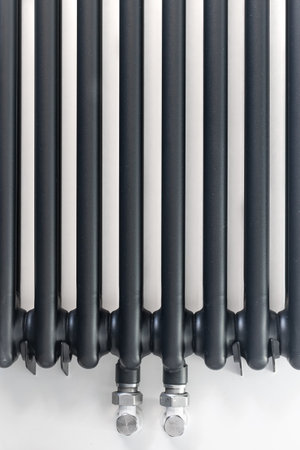 Graphite sectional radiator. Vertical symmetry. Heating designの写真素材