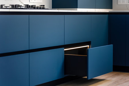 Modern blue kitchen cabinets. Minimalist kitchen interior. Stylish furniture designの写真素材