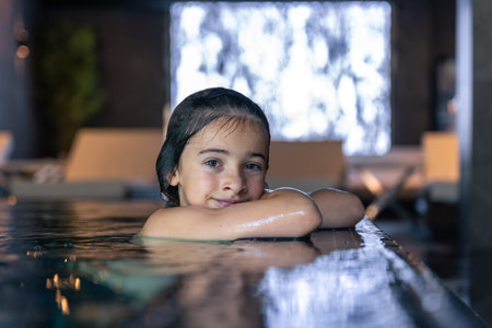 Calm gaze in spa water. Quiet portrait.