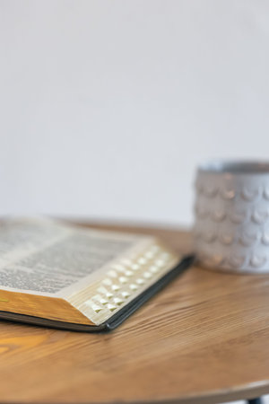 Vertical copy space for faith quotes. Bible and silence.