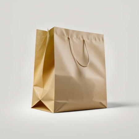 Brown paper shopping bag isolated on white background. 3d rendering.の素材