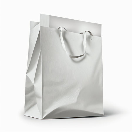 White paper shopping bag isolated on white background. 3D illustration.の素材