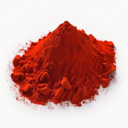 A pile of red paprika powder isolated on a white background.の素材