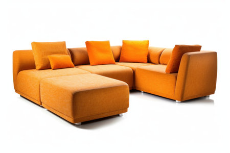 Sofa with orange cushions isolated on a white background.の素材