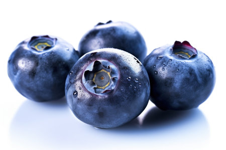 Blueberries with water drops isolated on a white background. Macro.の素材