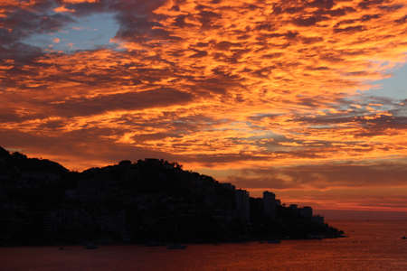 Sunset in the city of Acapulco, Mexicoの写真素材