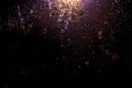 dark old scary rusty rough golden and copper metal surface texture/background for Halloween or haunted house games background/texture of wallの写真素材