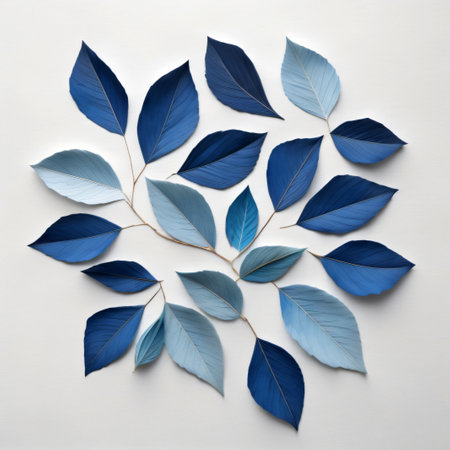 Set of blue leaves on white background. Flat lay, top viewの写真素材