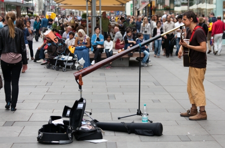 Street musician performing in Vienna, Austria