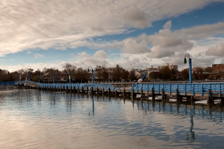 Damaged Ocean Avenue bridge in the aftermath of the Superstorm Sandy on October 30, 2012 in the Sheepshead Bay, Brooklyn, New York, USA.のeditorial素材