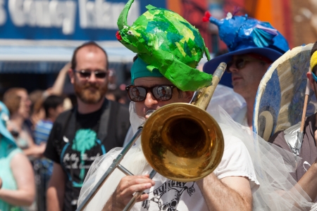 Unidentified participants of the 29th annual Coney Island Mermaid Parade on June 22, 2013 at Coney Island, Brooklyn, NY, USA. のeditorial素材
