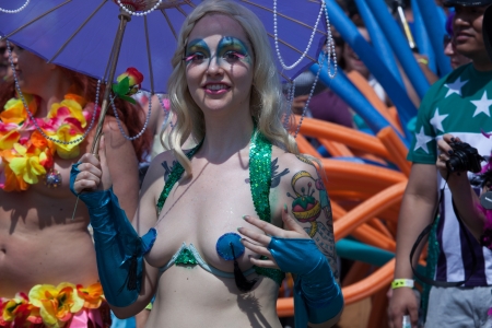 Unidentified participants of the 29th annual Coney Island Mermaid Parade on June 22, 2013 at Coney Island, Brooklyn, NY, USA. のeditorial素材