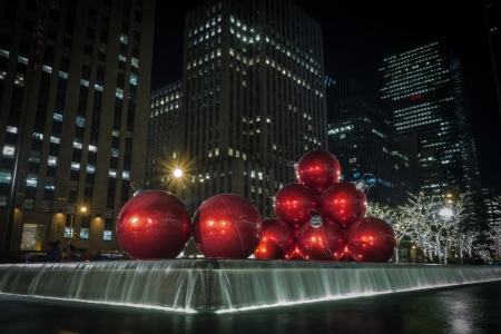 One of the most photographed holiday decorations on Sixth Avenue are the giant Christmas ornaments in front of 1251 Sixth Avenue building  Exxon Building  across from the Radio City Music Hall のeditorial素材