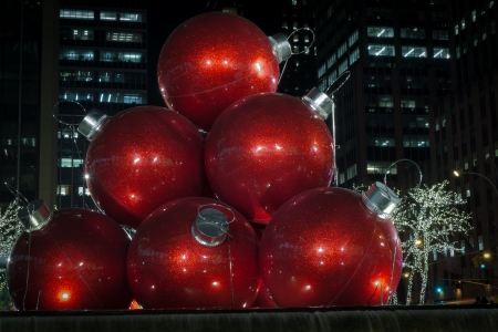 One of the most photographed holiday decorations on Sixth Avenue are the giant Christmas ornaments in front of 1251 Sixth Avenue building  Exxon Building  across from the Radio City Music Hall のeditorial素材