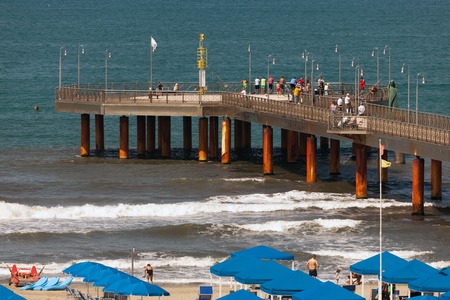 Pier at the luxurious Mediterranean beach on June 27, 2014 in Marina Di Pietrasanta, Italyのeditorial素材