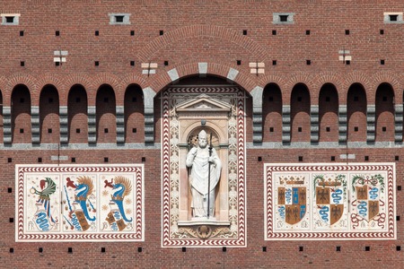 Coat of arms of the Visconti family on the wall of the Filarete Tower of the Castello Sforzesco in Milanのeditorial素材