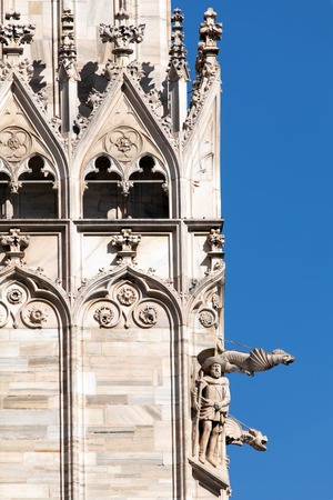 Milan cathedral is the third largest church in the world. It was begun by the Visconti family in 1386 and finished by Napoleon in 1805 more than four centuries later.の写真素材