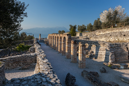 Grottoes of Catullus is the ruins of a Roman villa built in 8754 BC at the northernmost end of the peninsula of Sirmione on the southern shore of Lake Gardaの写真素材