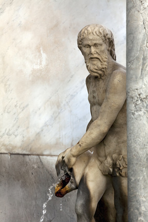 Fragment of the monumental Fountain of the Giant, also called the Fontana dell'Immacolatella, designed in the 1600s by Michelangelo Naccherino and Pietro Bernini for the Royal Palace of Naples, Italyのeditorial素材