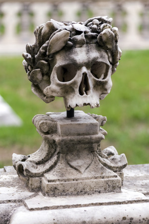 Medieval cemetery of the Carthusian monks is marked by skulls on the balustrade in the cloister at the Certosa di San Martino monastery in Naples, Italyの写真素材