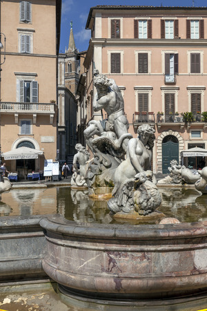 ROME, ITALY - JULY 30 2015: Fontana di Nettuno, at the northern end of the Piazza Navona, was built by Giacomo della Porta in 1576, while the statue of Neptune dates from the 19th century.のeditorial素材