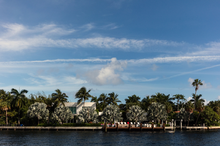 SUNNY ISLES BEACH, FL - JANUARY 1 2016: Luxury villas in the Sunny Isles Beach, located on a barrier island in northeast Miami-Dade County, Florida.のeditorial素材