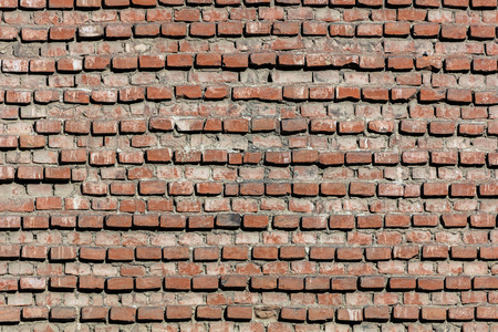 Texture of the medieval brick wall of the Pavia's Cathedral