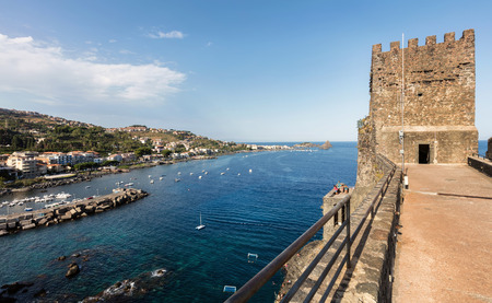 The Aci Castello's castle is situated on a ridge of lava, dominating the surrounding square. Built by the Normans from black lava stone between 1076 and 1081.のeditorial素材