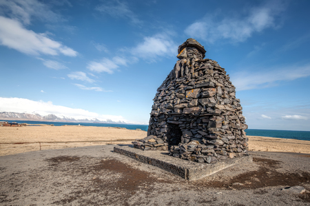 Statue of Bardur Snaefellsnes, half-man, half-giant that is said to roam the Snaefellsnes glacier in Iceland. Made in 1985 by the sculptor Ragnar Kjartansson.のeditorial素材