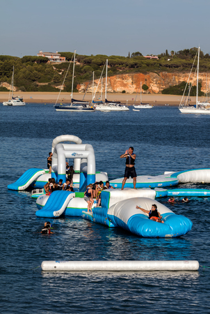 Navibordo Water Sports installation on the Portimao's Praia da Rocha beachのeditorial素材
