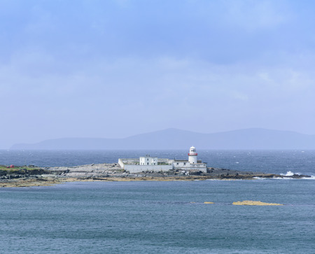 lighthouse on the shoreの写真素材