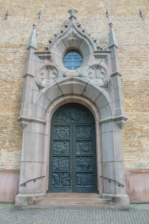 metal entrance door to the old Christian Catholic Churchの写真素材