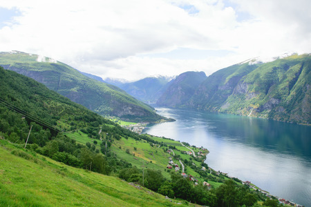 landscape view from the heights along the steep rocky fjordの写真素材