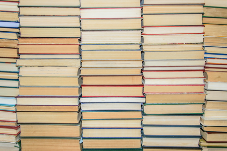 closeup the wall of books on library shelvesの写真素材