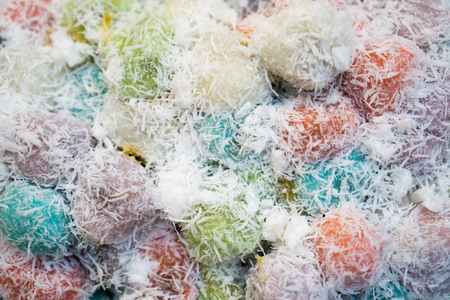 glutinous coconut ball and roll over grated coconut, Thai historical dessert called Ka Nom Tomの写真素材