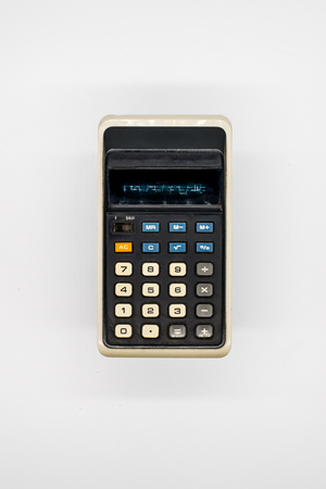 vintage calculator isolated on white background. Top view of calculator.の写真素材