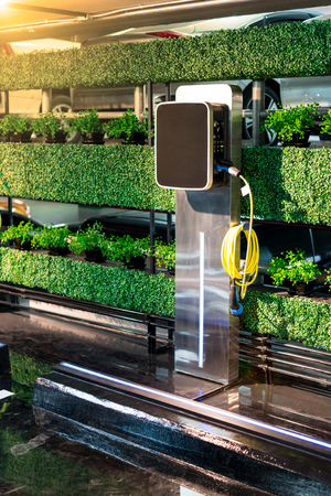 Electric car charger, premium service at parking lotの写真素材