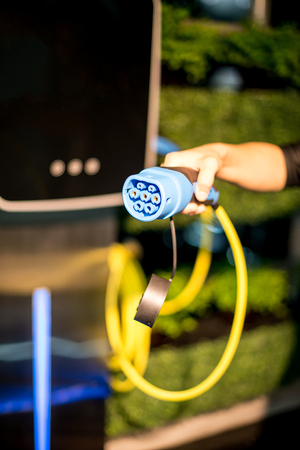 Electric car charging connector. Selective focus.の写真素材