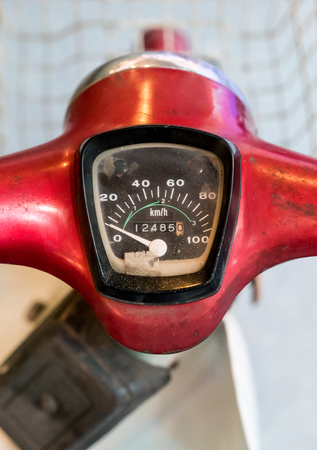 close-up vintage motorcycle speedometer with black frame.の写真素材