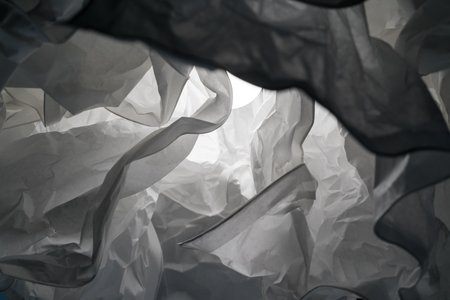 Close up decorative lamp for abstract background. Wavy paper structure with light and shadow. White complexity concept.の写真素材