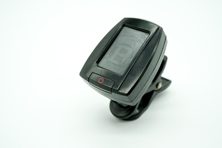 Digital guitar and ukulele clip tuner isolated on white background.の写真素材