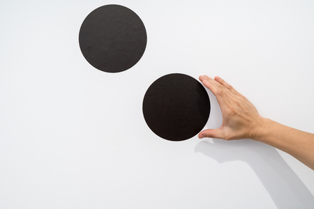 Woman using hands with dot graphic on white wall. Business info graphic interface design concept.の写真素材