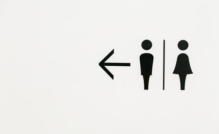 Man and lady toilet sign on white backround in shopping mall.の写真素材