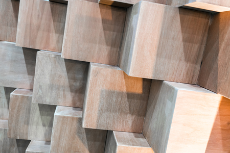 Wooden cube boxes creating abstract geometric wall background