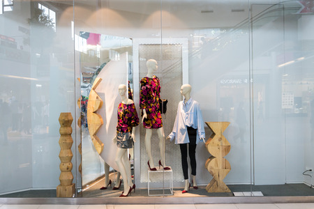 Mango shop at Emquatier Thailand, Aug 31, 2017: Luxury and fashionable brand window display. Casual woman clothing and bag showcase in modern style in front of the store.のeditorial素材