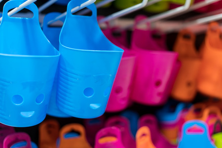 Multi purpose hanging plastic container for stuff organizer. Toothbrush containerの写真素材