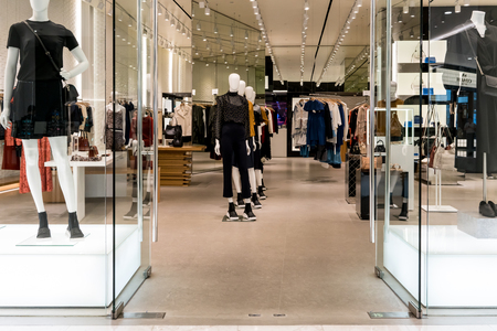 DKNY shop at Emquatier, Bangkok, Thailand, Sep 3, 2017 : Luxury and fashionable brand window display. New collection of clothings and bag showcase at flagship store.のeditorial素材